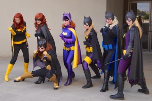 Batgirls from 2012, with the best-looking half of Garber Geektography crouching in front.