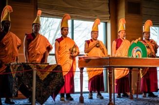 The monks open the ceremony and bless the site of the mandala through their chanting.