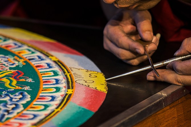 The filigree on the outermost ring represents the flames of wisdom that purify the one who enters into the mandala.